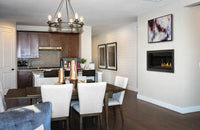Napoleon Ascent Linear 42 gas fireplace lifestyle shot in dining room and kitchen