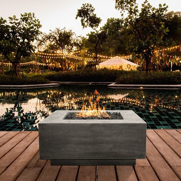 42-inch square Tavola 42 concrete fire pit table by Prism Hardscapes with custom patina finish