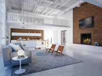 Napoleon Elevation X 42 gas fireplace lifestyle shot with porcelain panels and driftwood logs