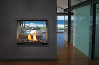 Napoleon High Definition 81 gas fireplace lifestyle shot in bedroom with rock media