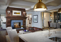 Napoleon High Definition 81 gas fireplace lifestyle shot in living room with logs