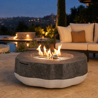 American Fyre Designs Meadow 48" Round Fire Table - Dark Basalt & White Aspen, Natural Gas — lifestyle