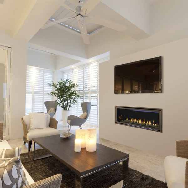 Jade42 with pictured bronze CFT front, driftwood, reflective panels and accent lighting; optional configuration. AI-assisted editorial visualization preserving the manufacturer-photographed installation. Installation must follow the actual supplied manual.