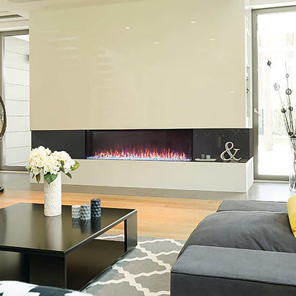 Trivista™ Primis 60 three-sided built-in electric fireplace with customizable ember and flame colors, 9,000 BTU heating, and multi-colored LED lights.