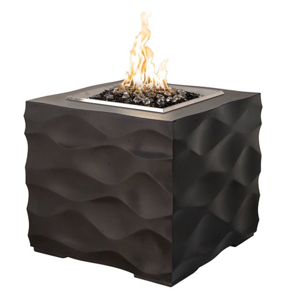 Voro Cube black lava firetable creating warm outdoor ambiance with adjustable flame
