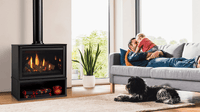 Majestic Ruby 30 freestanding gas fireplace with cabinet lifestyle room shot