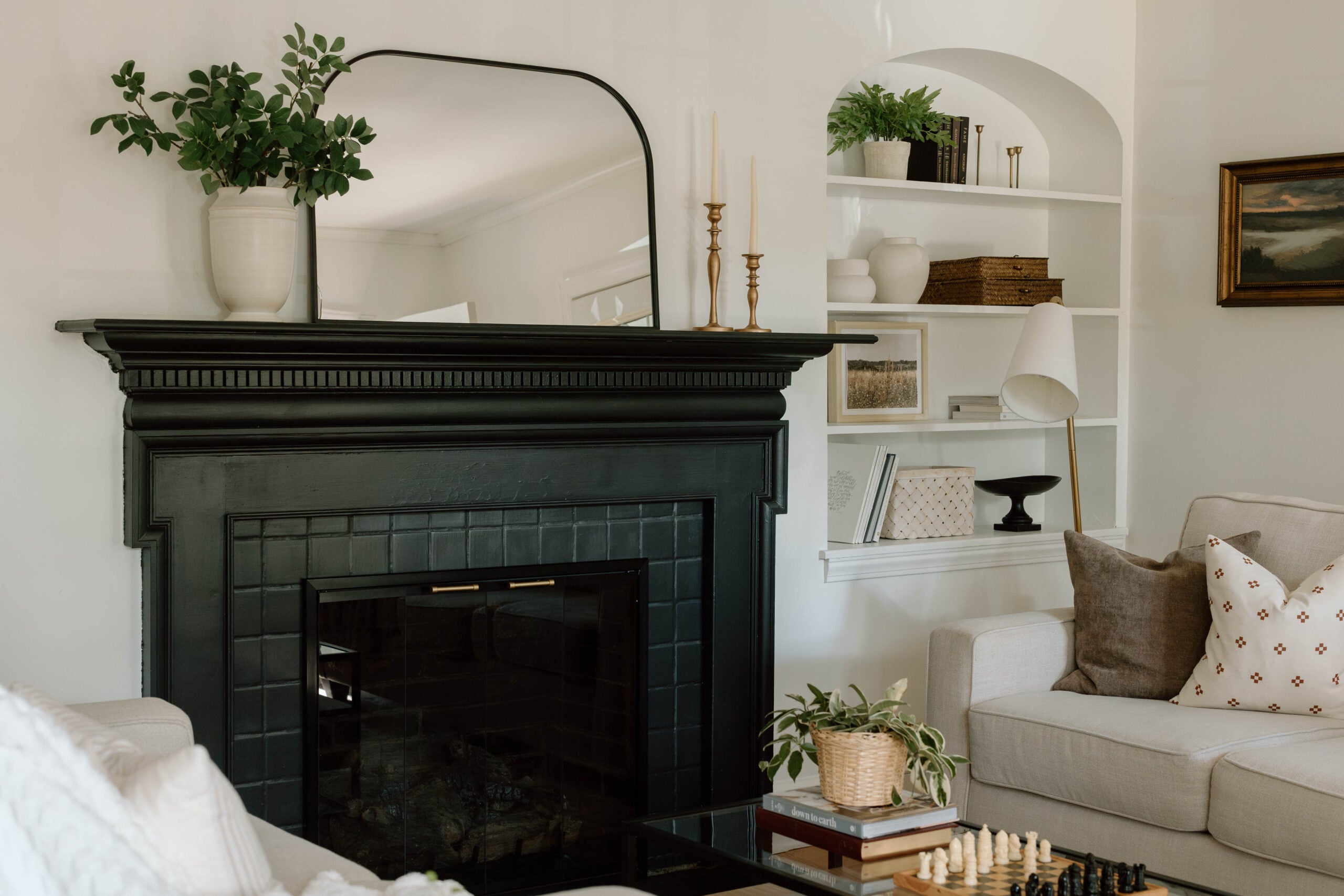 Fireplace doors and the finished surround in a living room