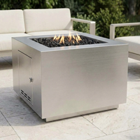 The Outdoor Plus 36" Forma Fire Pit — Stainless Steel — patio view