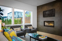 Napoleon Ascent Linear Premium 46 gas fireplace lifestyle shot with driftwood media