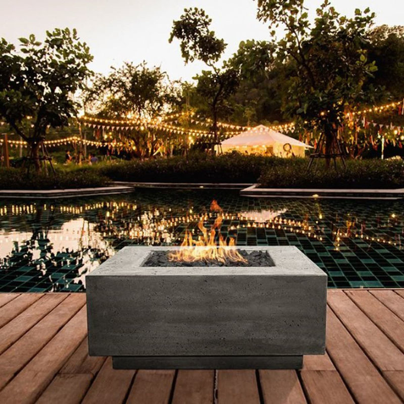 42-inch square Tavola 42 concrete fire pit table by Prism Hardscapes with custom patina finish