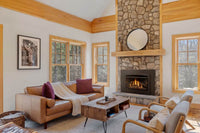 Napoleon Rosedale 3 gas insert lifestyle angle shot with MIRRO-FLAME panels and oak logs