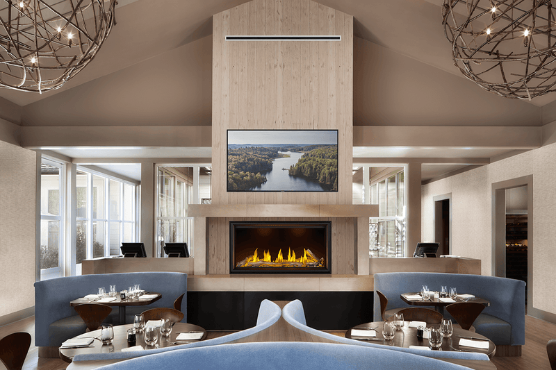 Napoleon Tall Linear Vector 50 gas fireplace lifestyle shot in restaurant setting