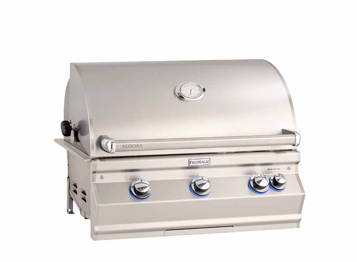 Fire Magic Aurora A660i Built-In Gas Grill — solid hood, shown with optional rotisserie and standard burners