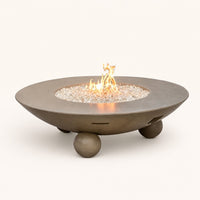 American Fyre Designs Versailles 54-Inch Round GFRC Gas Fire Table with Ball Feet — studio
