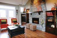 Dimplex 26" Multi-Fire XHD electric firebox with glowing logs and customizable flame effects in sleek black glass surround