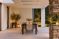 Platinum Electric — AI-styled evening setting based on manufacturer imagery; installation inspiration, accessories and additional heaters separate.