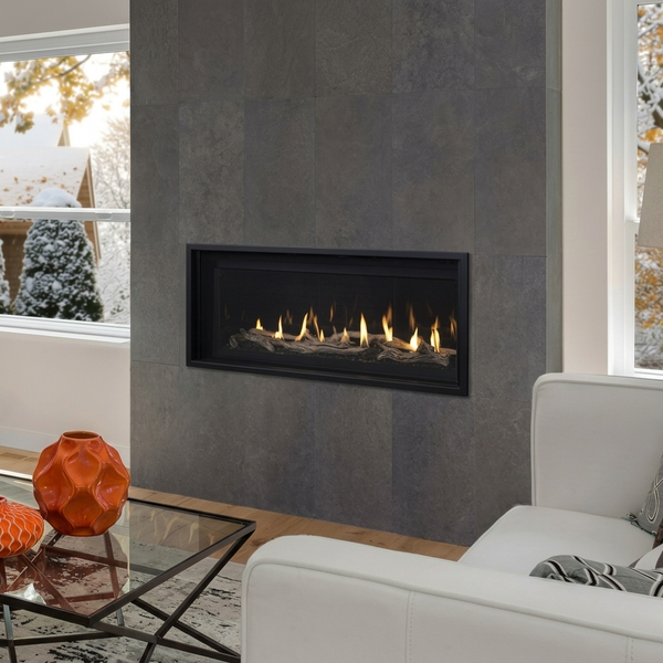 Superior DRL4048. Shown with optional driftwood log set; black painted interior and reflective black glass. AI-assisted editorial visualization preserving the manufacturer-photographed installation. Optional accessories are not represented as included in the base price. Installation must follow the supplied model-specific manual.