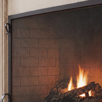 Smooth steel frame with hammered perimeter edge and side handle — close-up