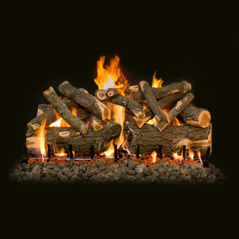 Grand Canyon Jumbo Weathered Oak Slimline Outdoor Gas Logs with stainless steel burners and realistic design outdoors