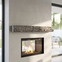 Half round non-combustible concrete mantel shelf with weathered grey finish and rockface stone look