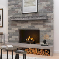 Natural cut stone non-combustible mantel shelf with greystone finish and hand-painted limestone details