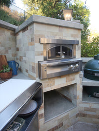 Built-in oven side-angle installation example; enclosure and surrounding appliances are not included