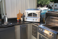 Countertop oven in an outdoor kitchen; other appliances and cabinetry are not included