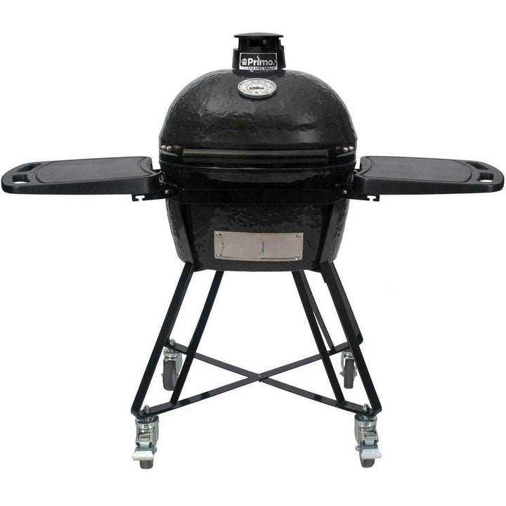 Primo All-In-One Oval Junior 200 ceramic kamado grill with cradle, side shelves, and stainless steel grates