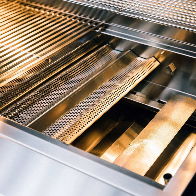 Close-up of the stainless steel cooking grates and flame tamers inside the TrueFlame 32 Inch Built-In Grill