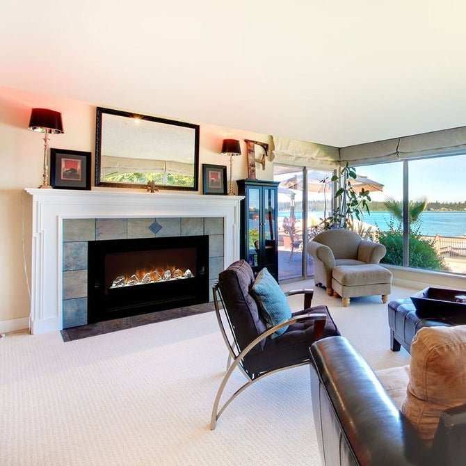 Modern Flames Home Fire 60 inch built-in electric firebox insert in a stylish living room with large windows and comfortable seating