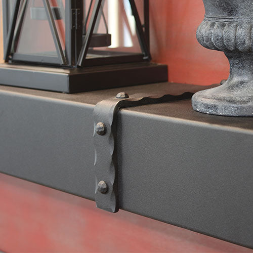 Close-up of Stoll Blacksmith decorative mantel banding